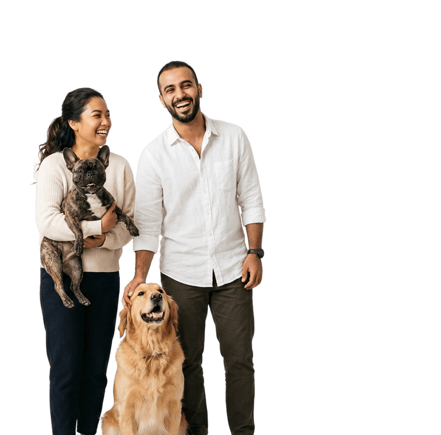Happy pet parents with their dog and cat
